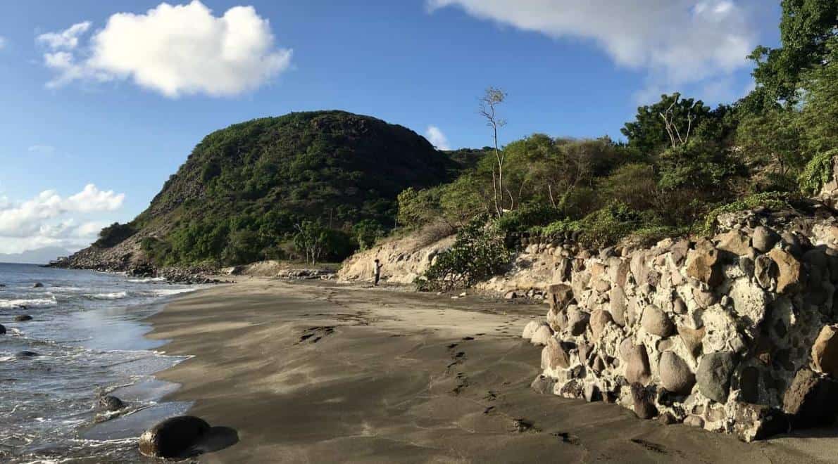 Ruins of the Water Fort St. Eustatius with in the background the Godet burial ground (copyright Kenneth Cuvalay)