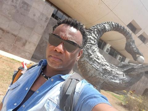 The first selfie I took of myself here was with this statue of the Bono Adinkra symbol Sankofa. Sankofa is a word in the Akan Twi and Fante languages of Ghana that translates to "go back and fetch, seek and take". It is represented by a bird with its hea